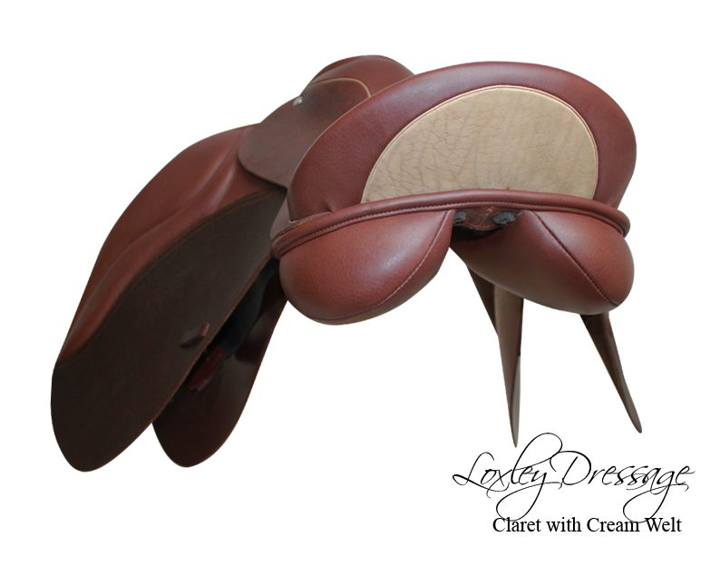 Loxley by Bliss dressage saddle in claret with cream accents