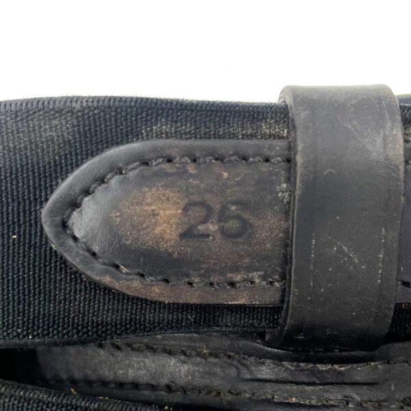 A close up of the number 2 6 on a belt