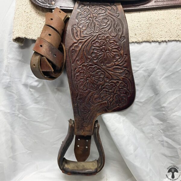 A close up of the leather strap on a horse