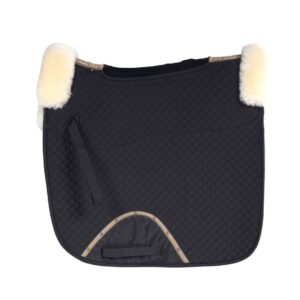 A black saddle pad with white fur on it.