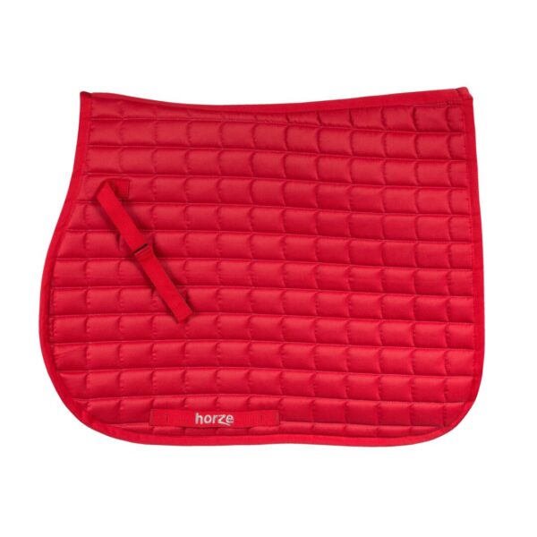 A red saddle pad with a white logo on it.