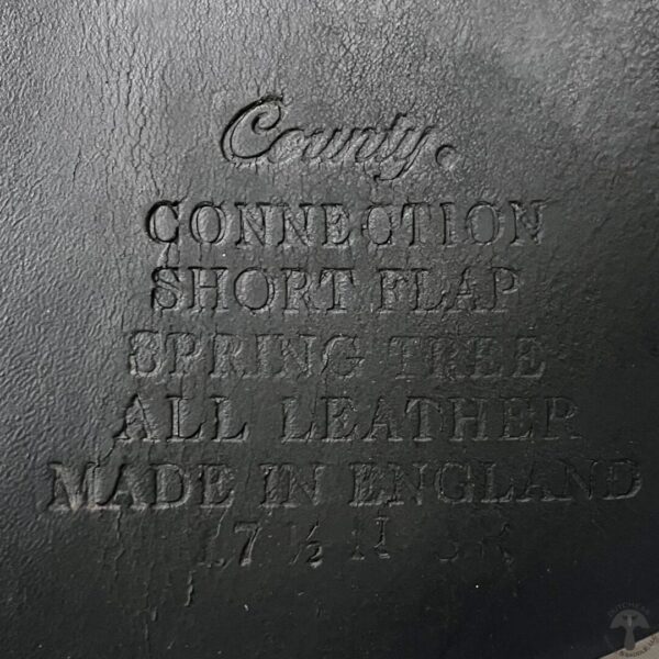 A close up of the words on a leather bag