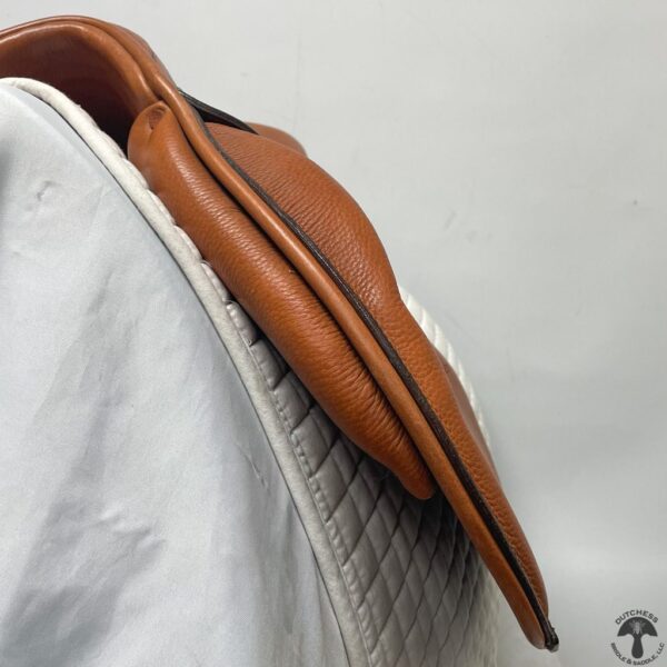 A close up of the saddle bag on a horse.