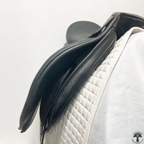 A close up of the saddle on a horse