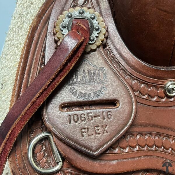 A close up of the saddle number 1 0 6 5-1 6 flex