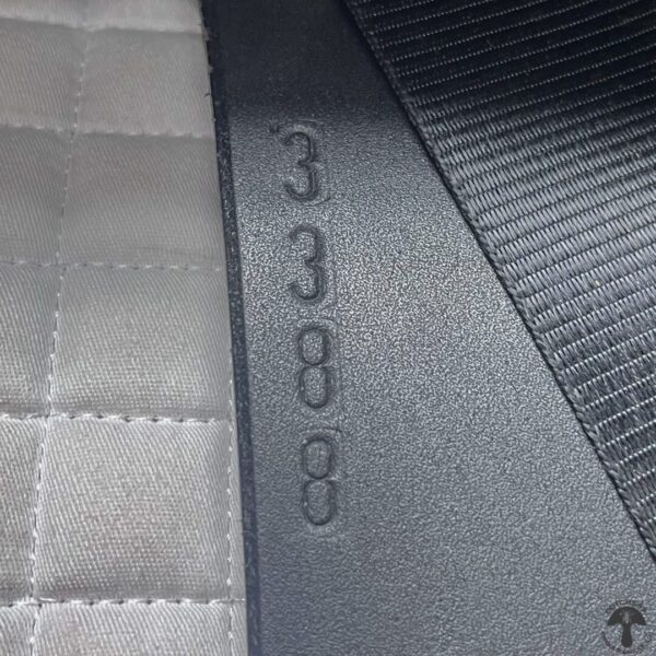 A close up of the number 3 3 8 8 on a car