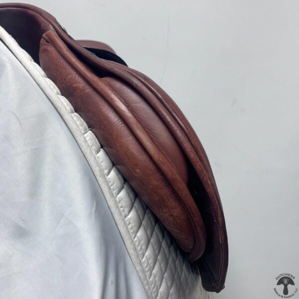 A close up of the back end of a horse saddle.