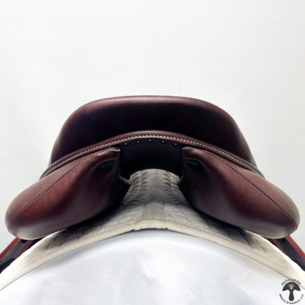 A close up of the saddle on a horse