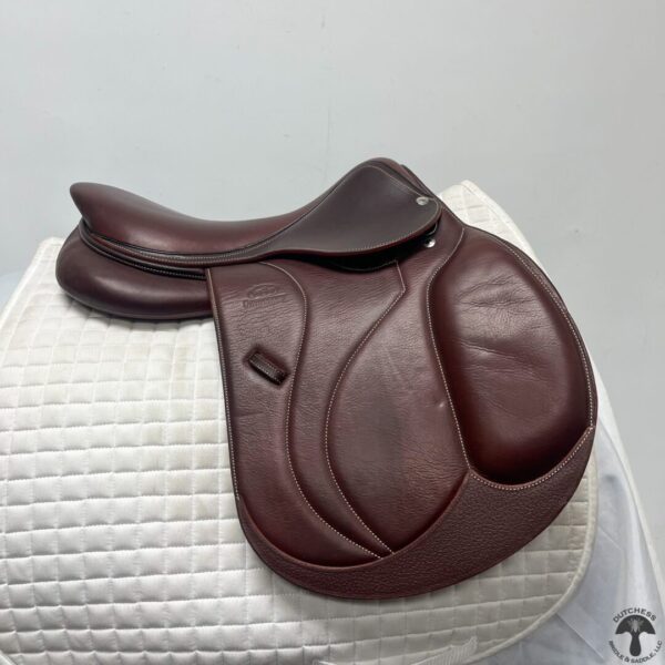 A close up of the saddle on top of a horse.