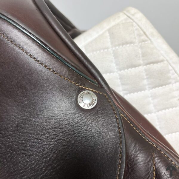 A close up of the leather on a horse saddle