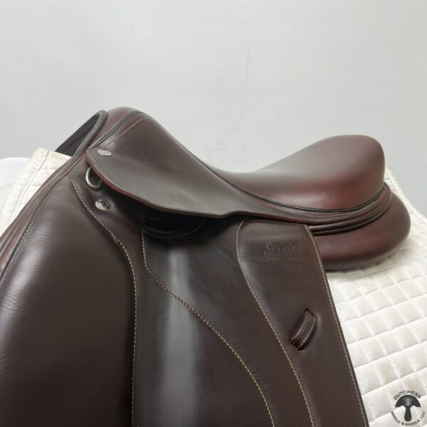 A close up of the saddle on a horse