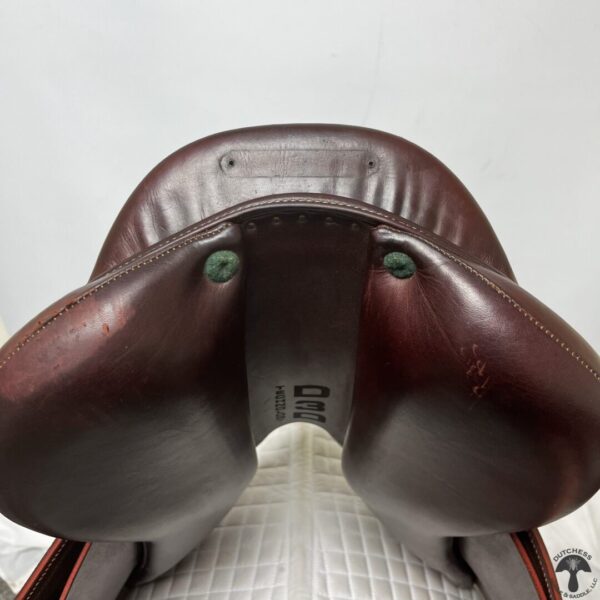 A close up of the back end of a horse saddle