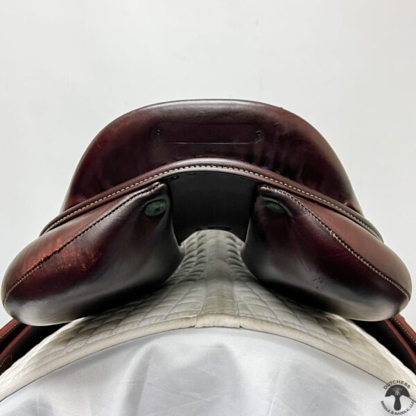 A close up of the saddle on a horse