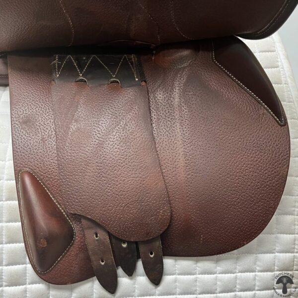 A close up of the back end of a horse saddle