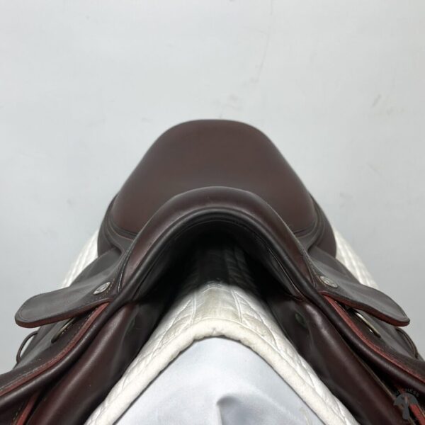 A close up of the saddle on a horse