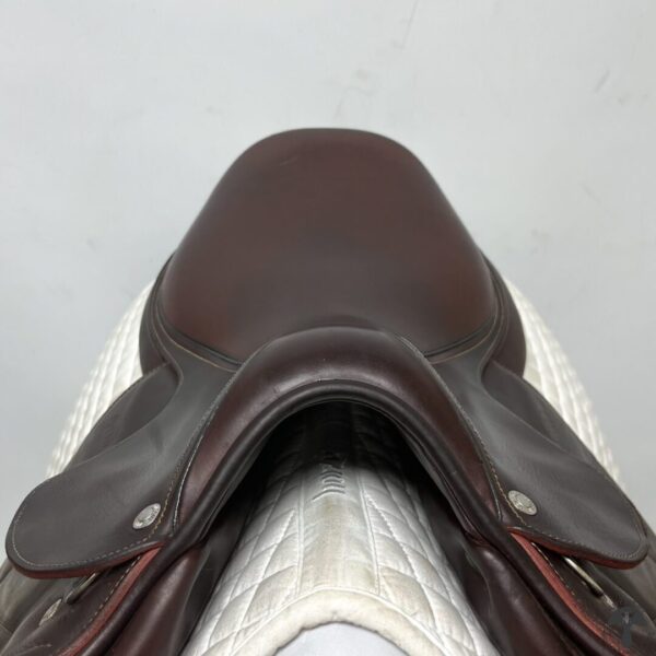 A close up of the saddle on a horse