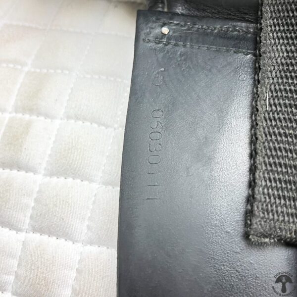 A close up of the leather and fabric on a bag