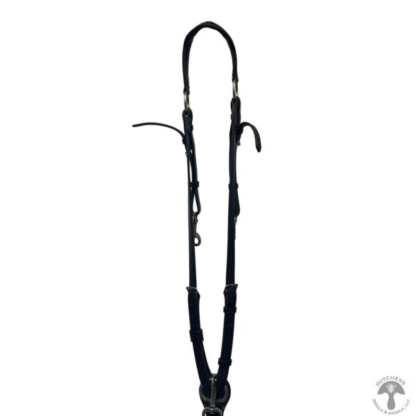 A black leather reins with white metal tips.