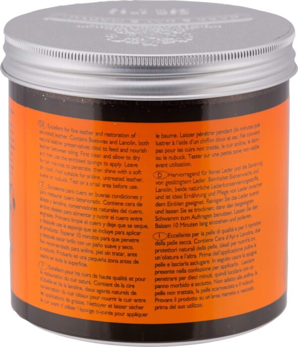 A jar of hair mask with orange and black label.