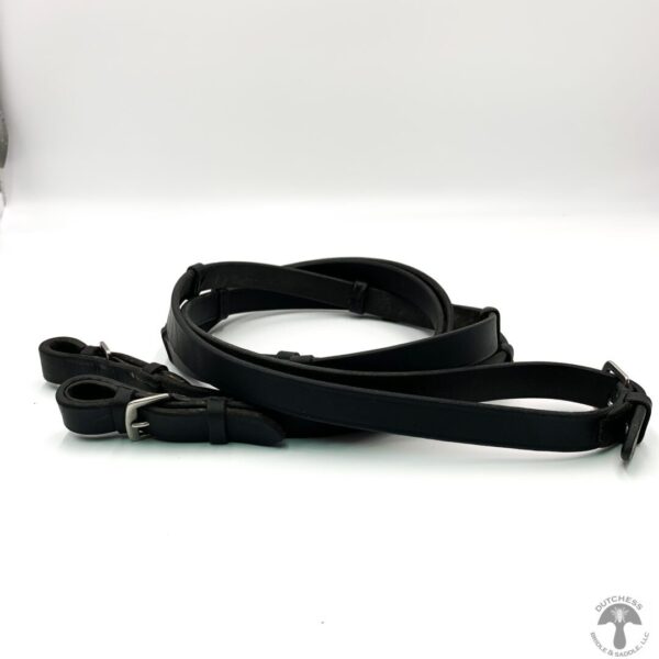 A black leather strap with a metal buckle.