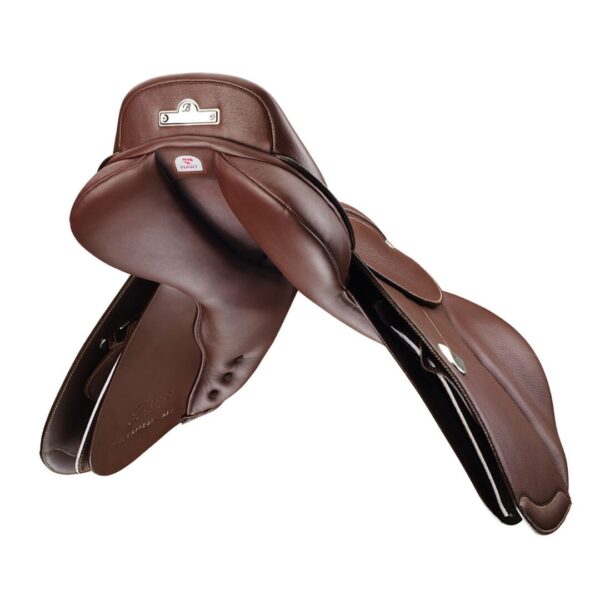 A pair of brown saddles on top of each other.