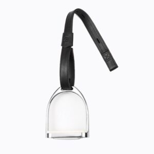 A clear glass bell with black leather strap.