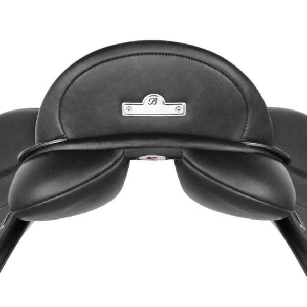 A close up of the back rest on a black motorcycle