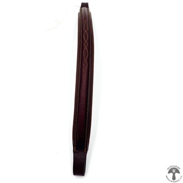 A brown piece of leather is bent to the side.