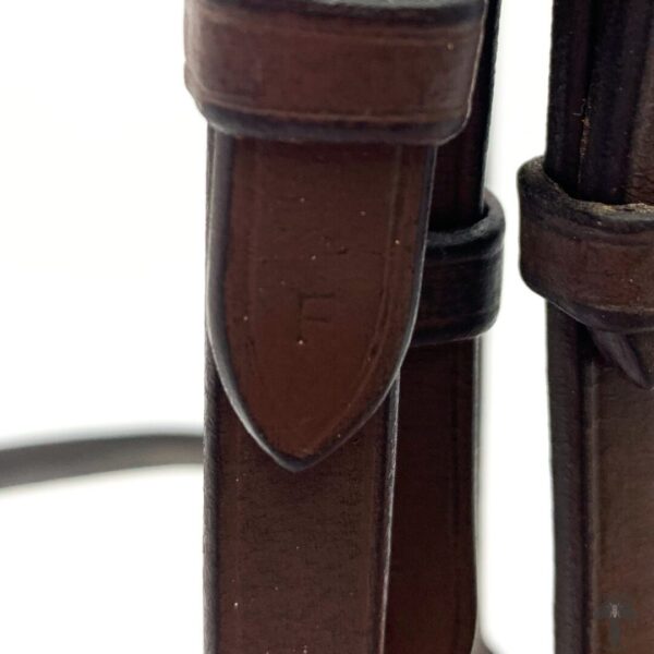 A close up of the leather on a horse.