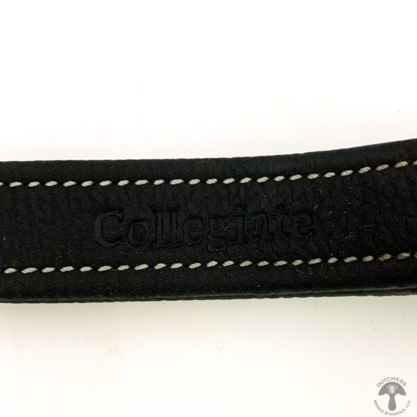 A close up of the black strap on a belt