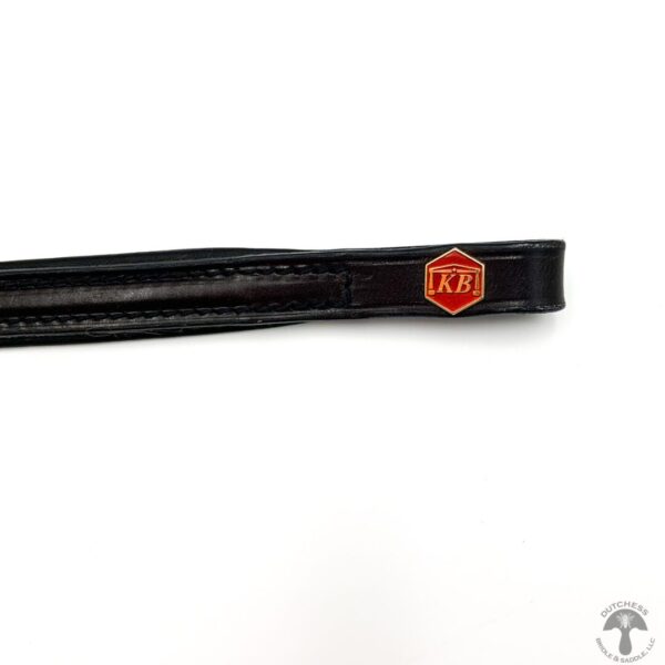 A close up of the strap on a black belt