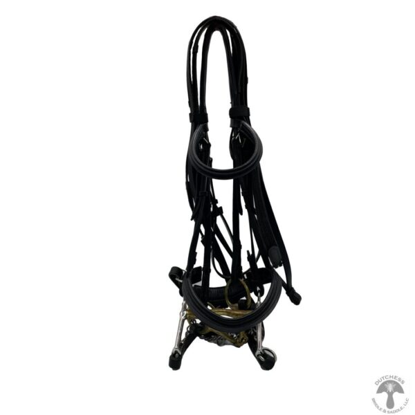 A black horse bridle and reins on top of a stand.