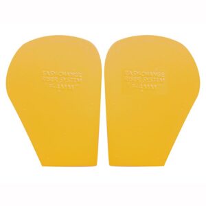 A pair of yellow pads for a person with a foot on them.