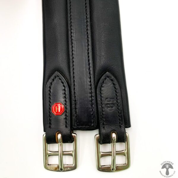 A close up of the side release buckle on a horse riding reins