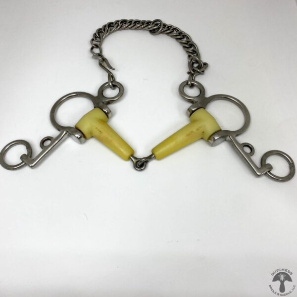 A pair of yellow plastic bit on a chain.