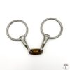 A pair of metal horse bit with a brown bead.