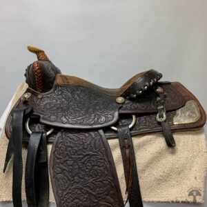 A saddle is shown with the horse 's head on it.