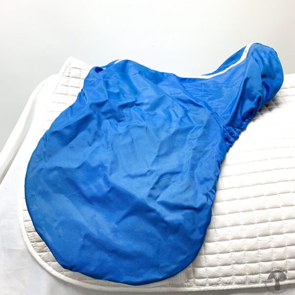 A blue bag sitting on top of a white surface.