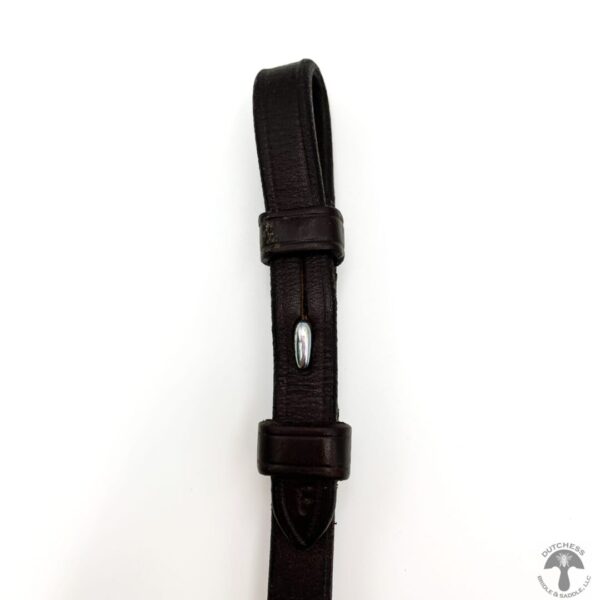 A black strap with a metal buckle on it.