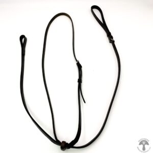 A pair of black leather leashes on a white surface.