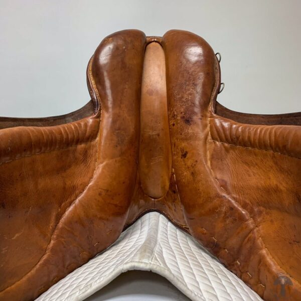 A close up of the saddle of a horse