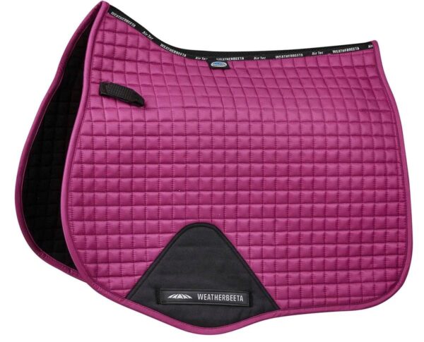 A pink saddle pad with black trim and squares.