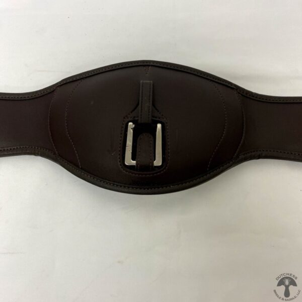 A close up of the buckle on a brown leather belt