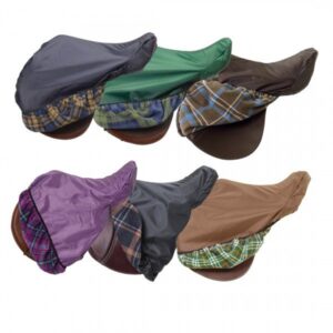 A group of six different colored saddles with covers on them.