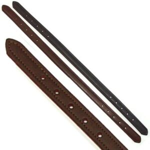 A pair of brown and black straps sitting next to each other.