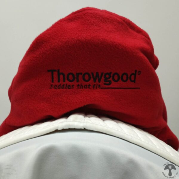 A red towel with the words " thorowgood " written on it.