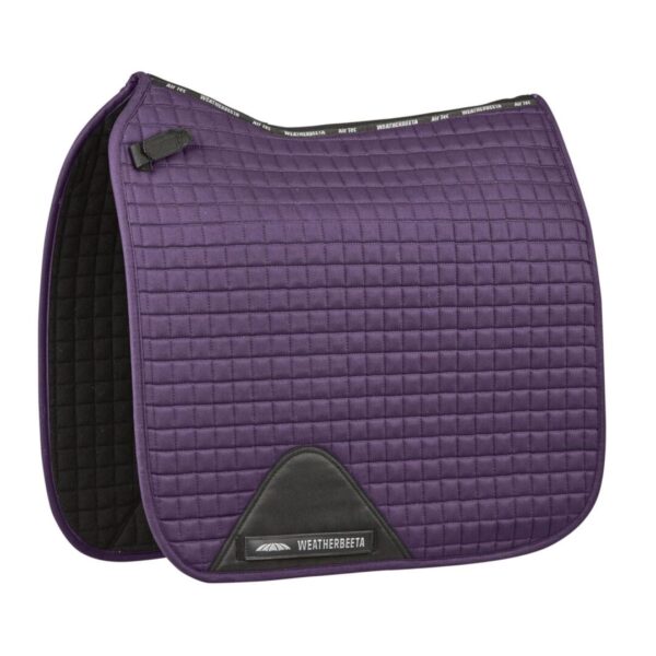 A purple saddle pad with black trim and a black strap.